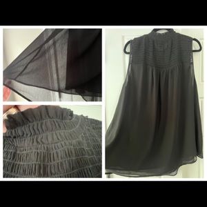 Black tank with shirred detail. Mock ruffle neck. Torrid size 3